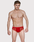 Man wearing the Luné d’Or Veil Lace Brief in red, front view showing the sheer floral lace front.