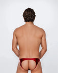 Back view of the Luné d’Or Éclat Men’s Jockstrap in metallic red, showing the open jockstrap back with elastic leg straps.
