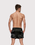 Back view of the Luné d’Or Men’s Satin Lounge Short in black.