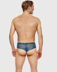 Back view of the Luné d’Or Veil Lace Brief in blue, showing the full lace seat.