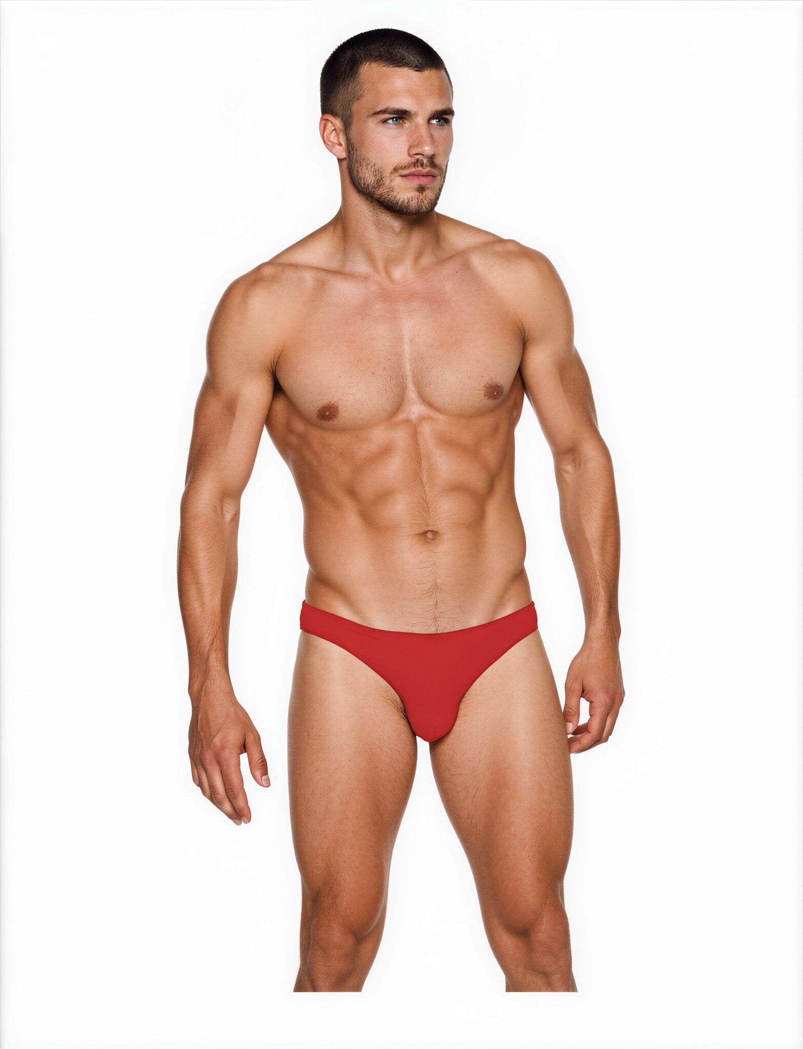 Man wearing the Luné d’Or Ligne Men’s Jockstrap in red, front view showing the smooth matte finish and sculpted contour pouch.